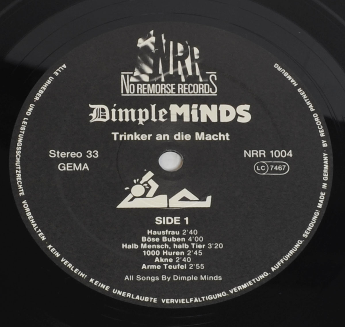 Close up of Side One record's label DIMPLE MINDS - Trinker an die Macht